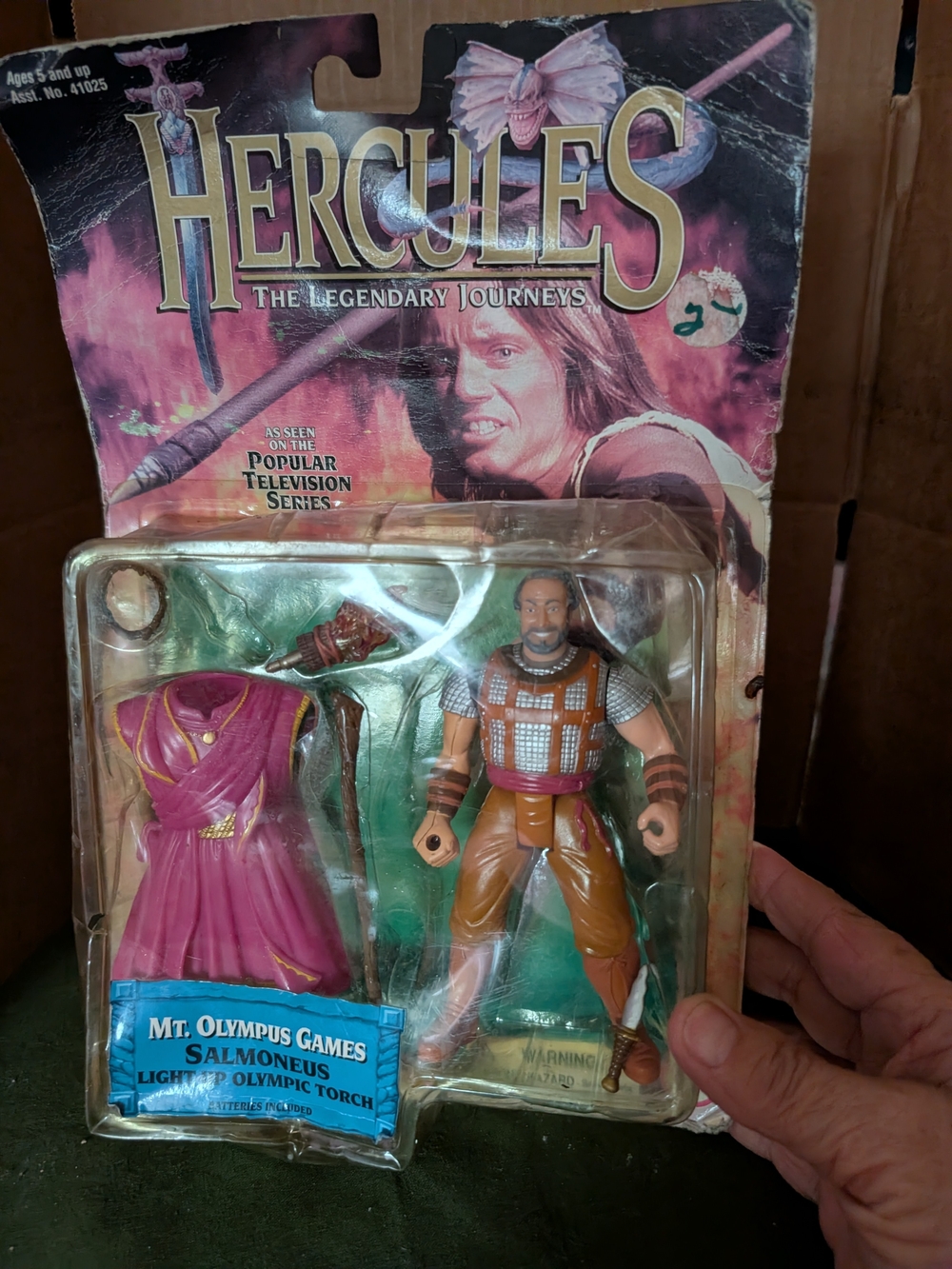 This is a vintage 1996 Toy Biz Salmoneus action figure from the Hercules